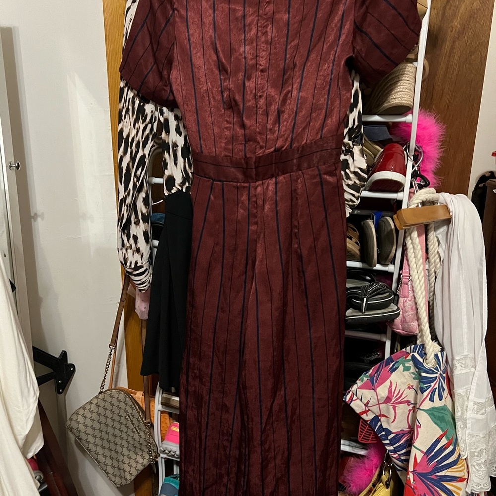 Beautiful brand new Jumpsuit. It’s a pretty Burgundy and Navy in color. - Picture 2 of 5